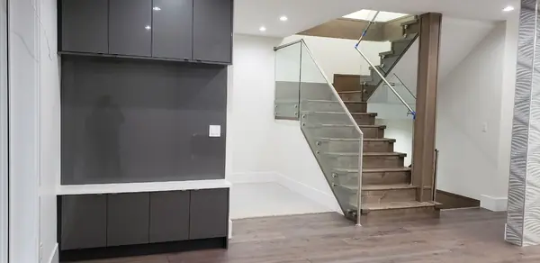 Glass-balustrade stair with timber treads