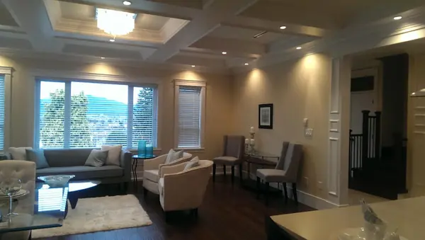 Living room with large windows framing the view