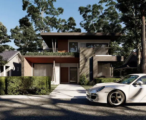 Street approach showing the driveway and landscaped frontage