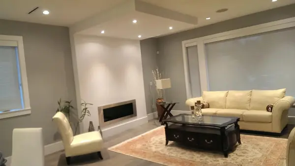Living room with fireplace and seating